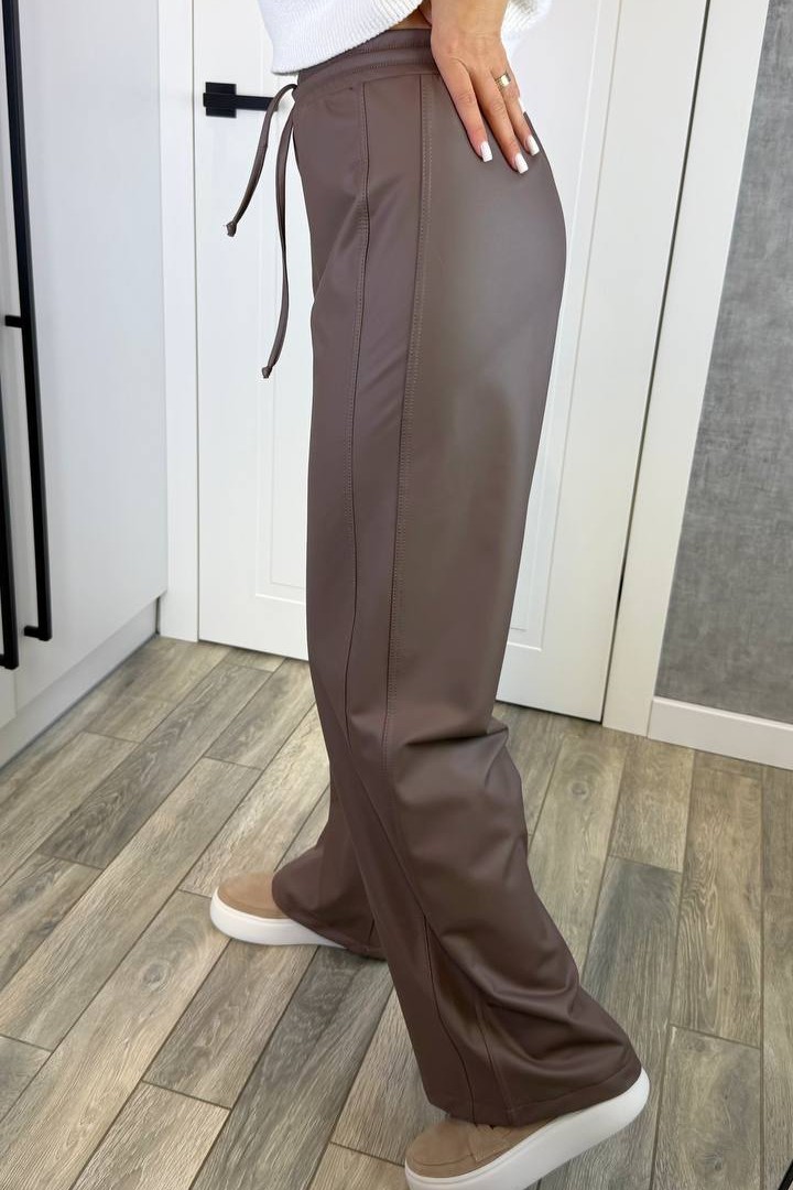 Кожаные брюки свободного кроя KG-124A390