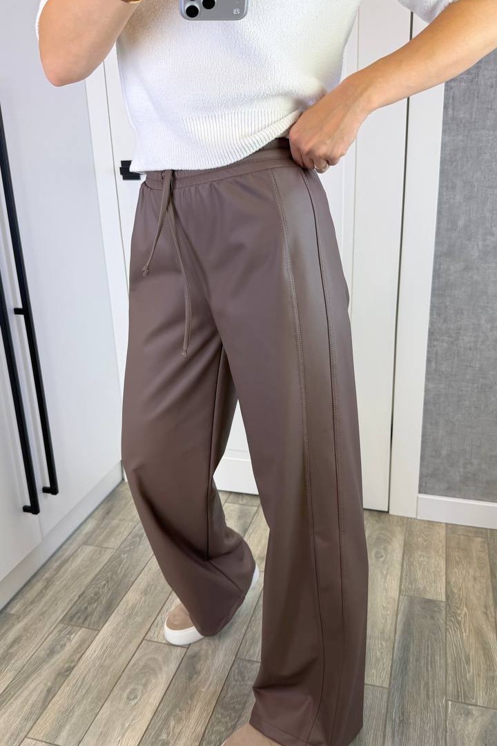 Кожаные брюки свободного кроя KG-124A390