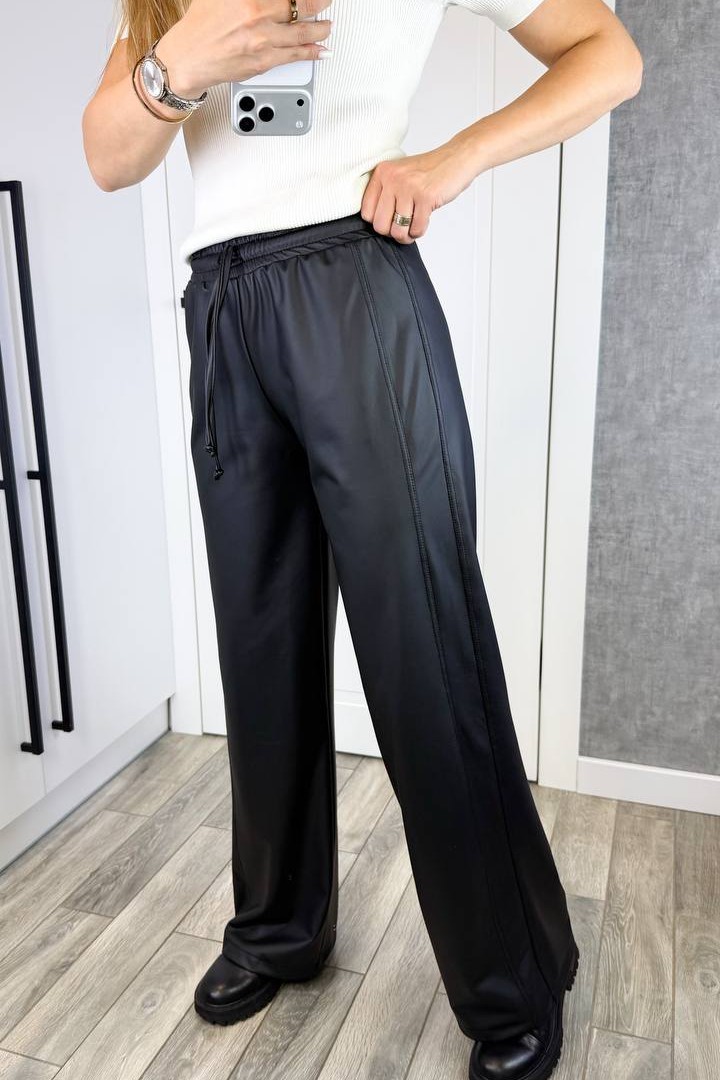 Кожаные брюки свободного кроя KG-124A390